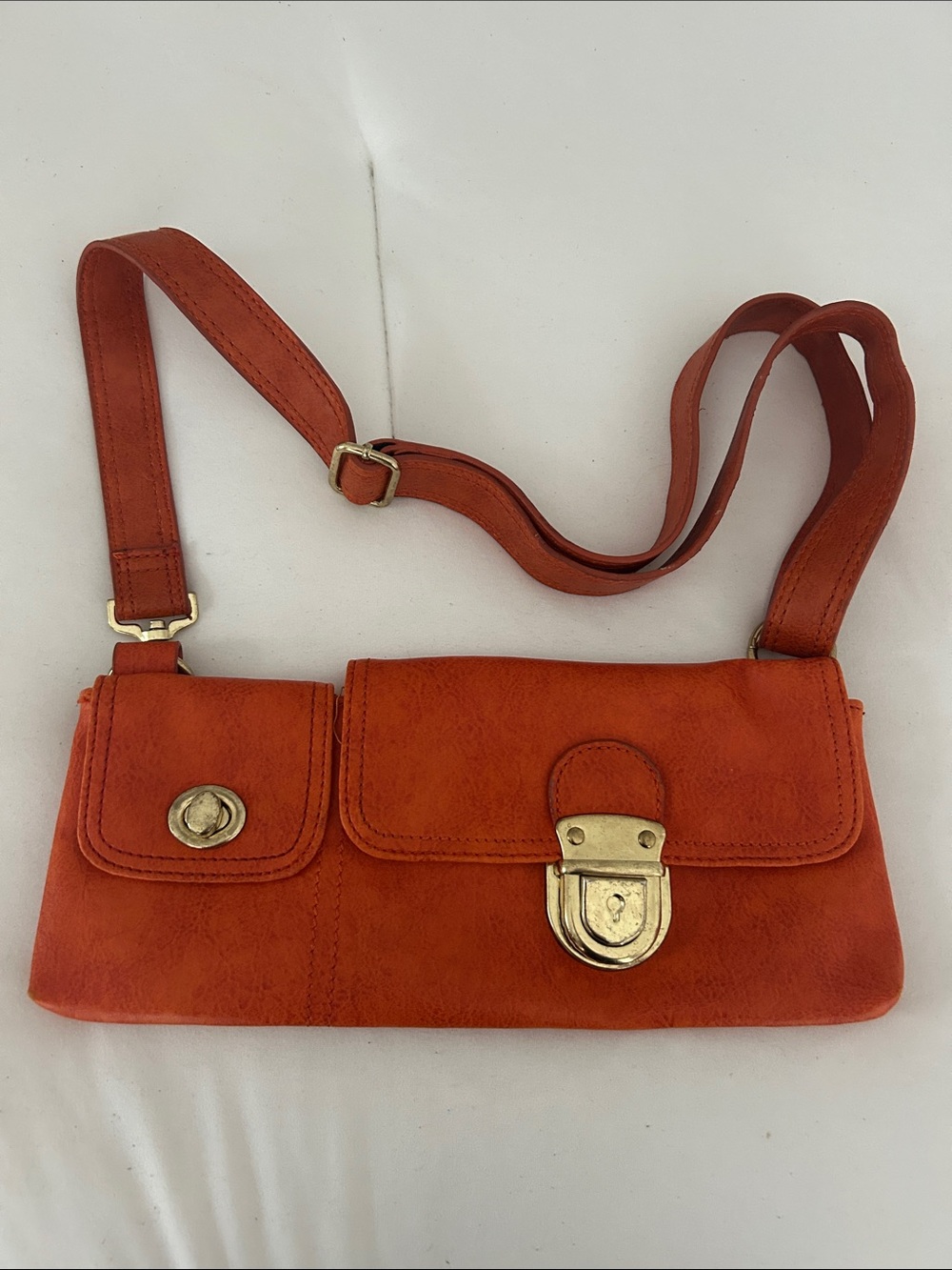 mark. Orange Leather Crossbody with Gold-Tone Locks